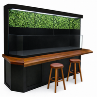 Professionally custom built turtle aquarium or paludarium with bar and bar stools plus a fax green wall designed for homes, schools, and public nature displays.