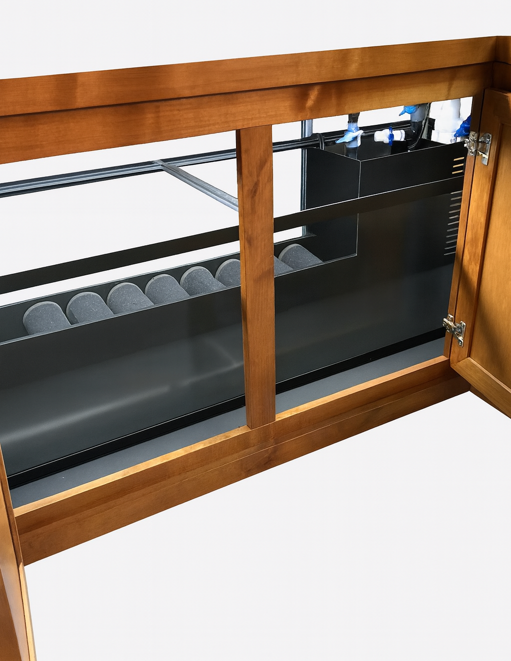 Wooden cabinet with open door revealing shelves and a turtle filter sump