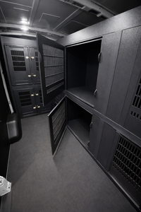 Custom animal transport van kennel system installed for pet taxi use