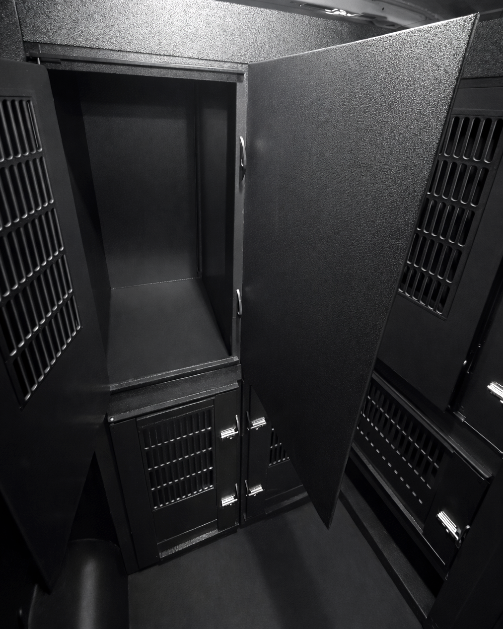 Custom animal transport van kennel system installed for pet taxi use