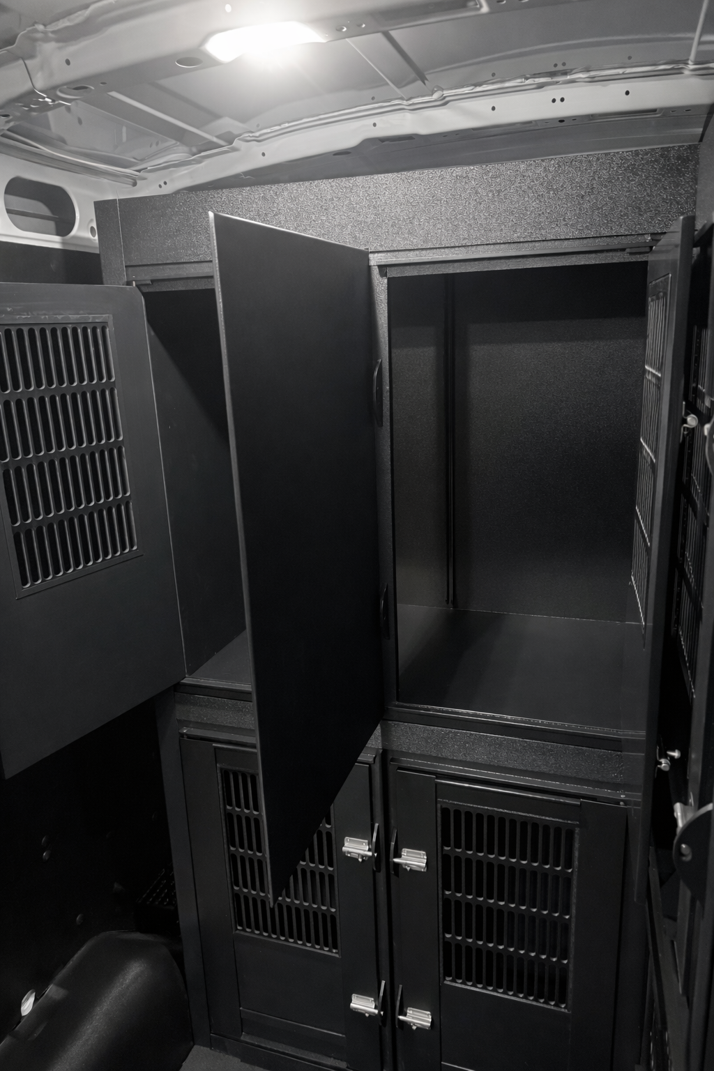 Custom animal transport van kennel system installed for pet taxi use