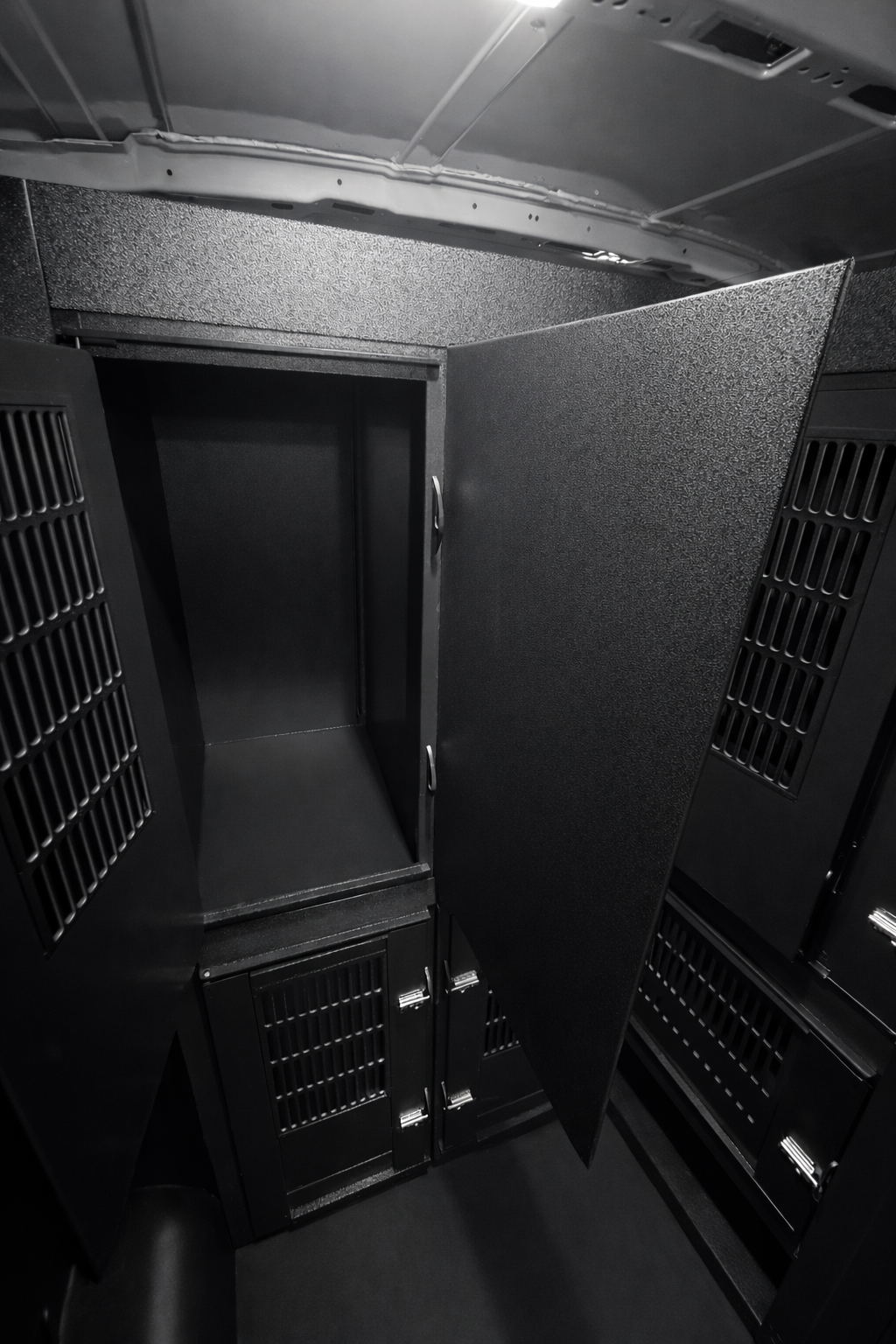 Custom animal transport van kennel system installed for pet taxi use