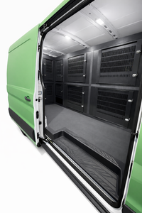 Custom animal transport van kennel system installed for pet taxi use