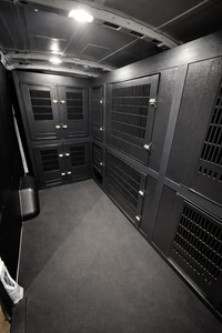 Custom animal transport van kennel system installed for pet taxi use