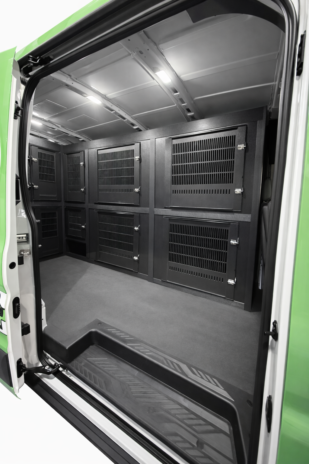 Custom animal transport van kennel system installed for pet taxi use