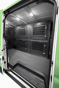 Custom animal transport van kennel system installed for pet taxi use